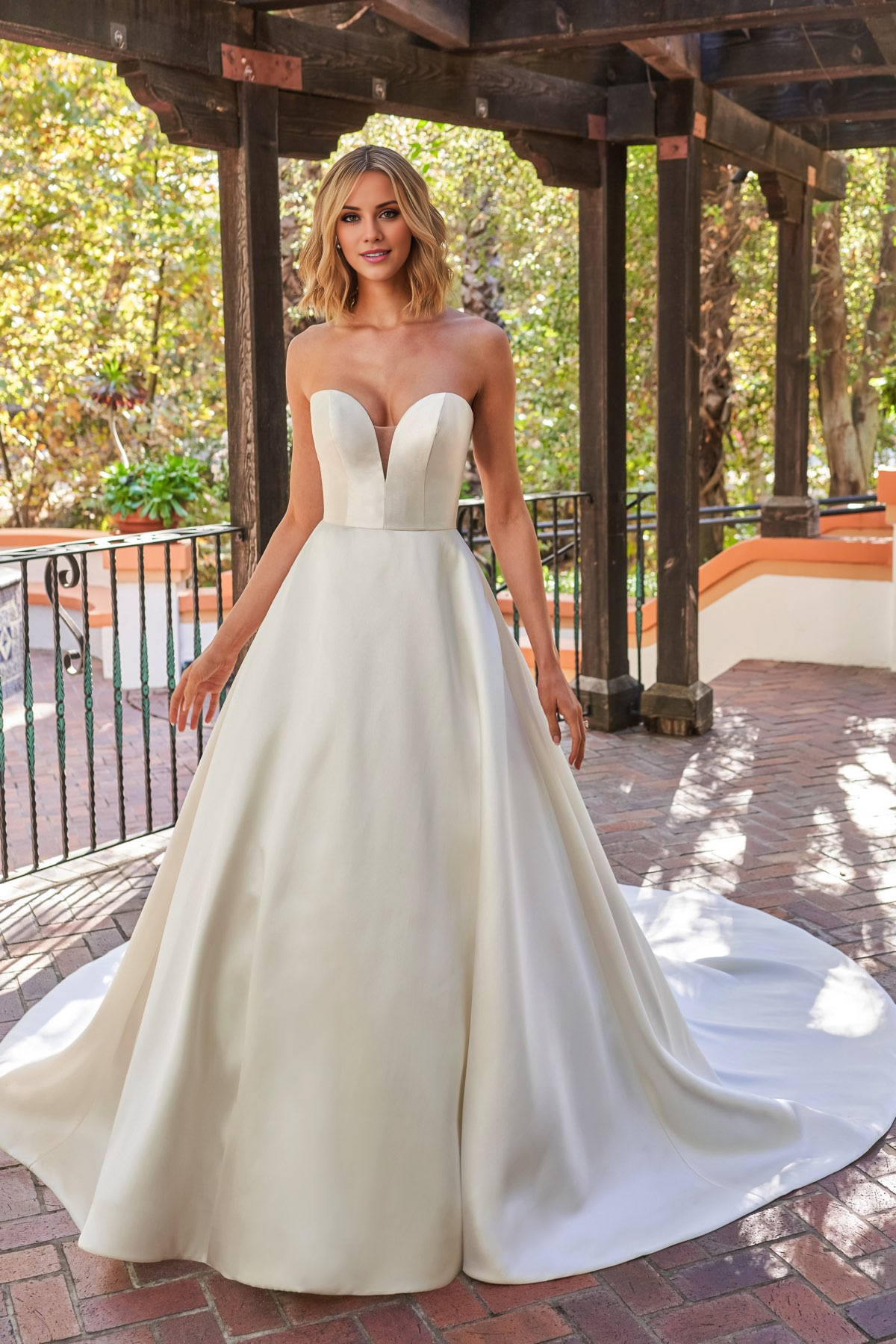 Simple deep V-neck strapless and floor length wedding dress