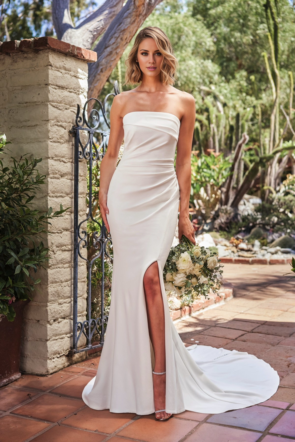 Strapless asymmetrical hanging crepe fitted horn and floor length wedding dress