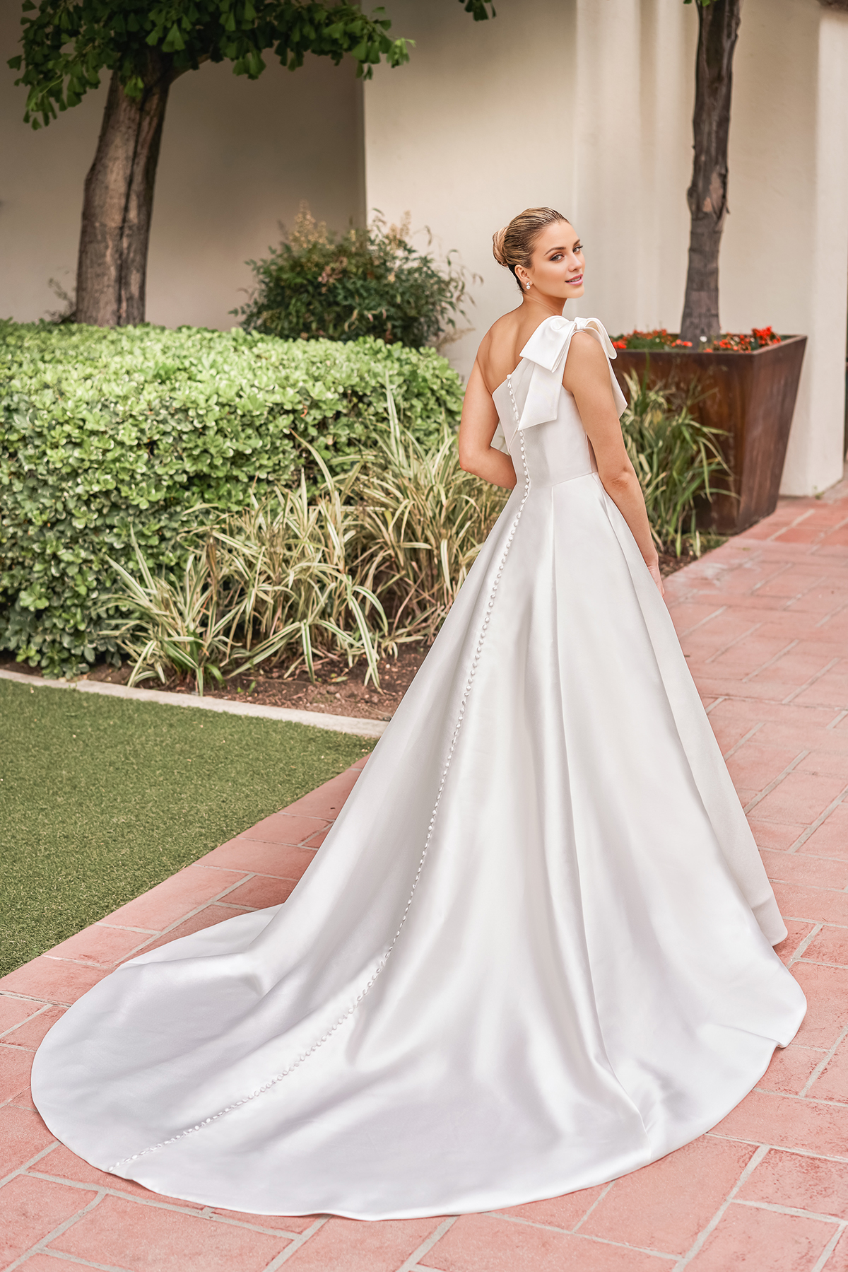 A-line shoulder asymmetrical bow tail and floor length wedding dress