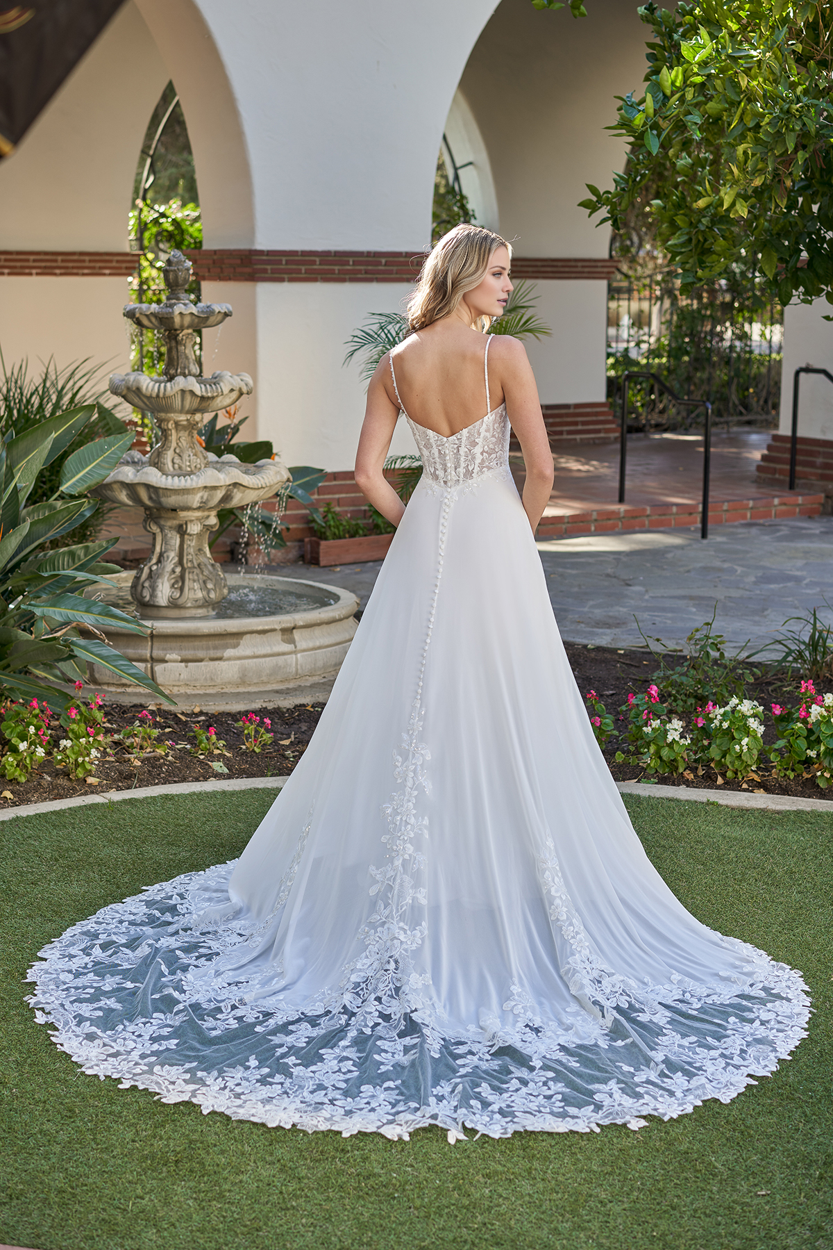 A-line tight corset with beaded thin shoulder straps and floor length wedding dress