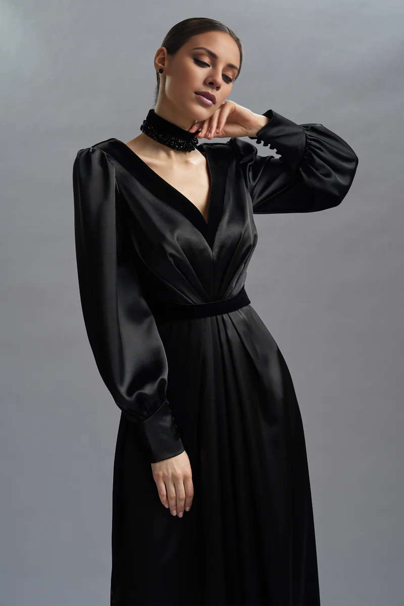 Deep V-neck satin long sleeved and floor length evening gown