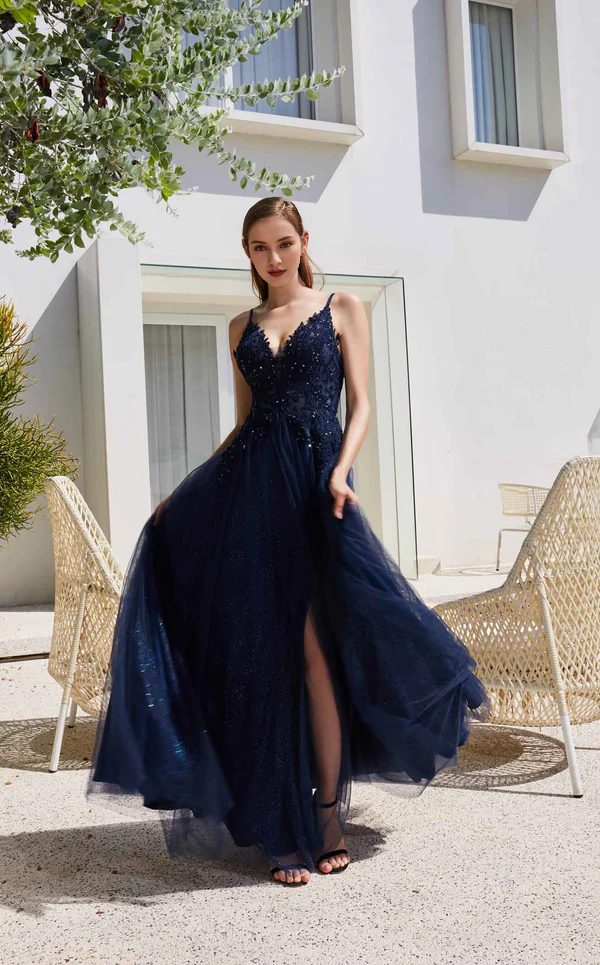 A-line V-neckline sleeveless tight fitting corset with sheer side slits and floor length gowns evening dresses