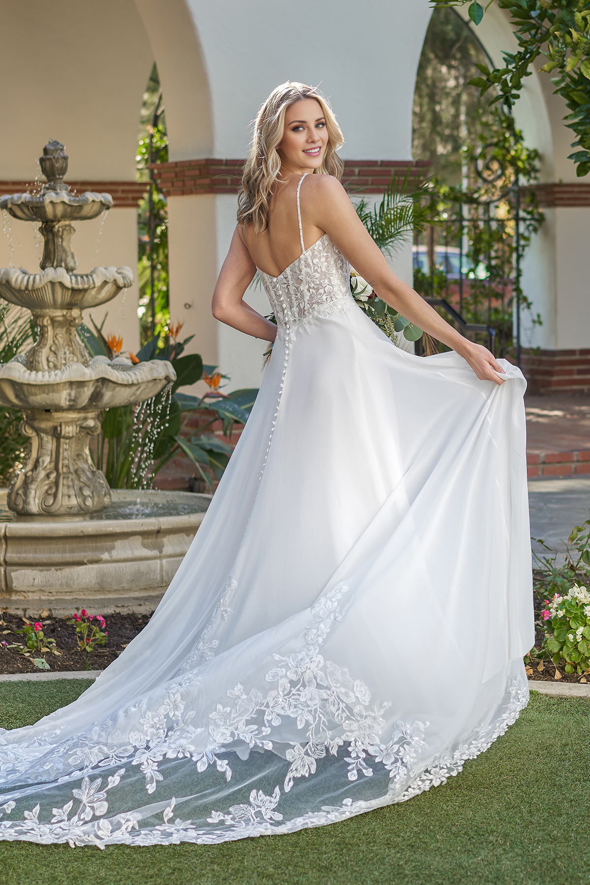 A-line tight corset with beaded thin shoulder straps and floor length wedding dress