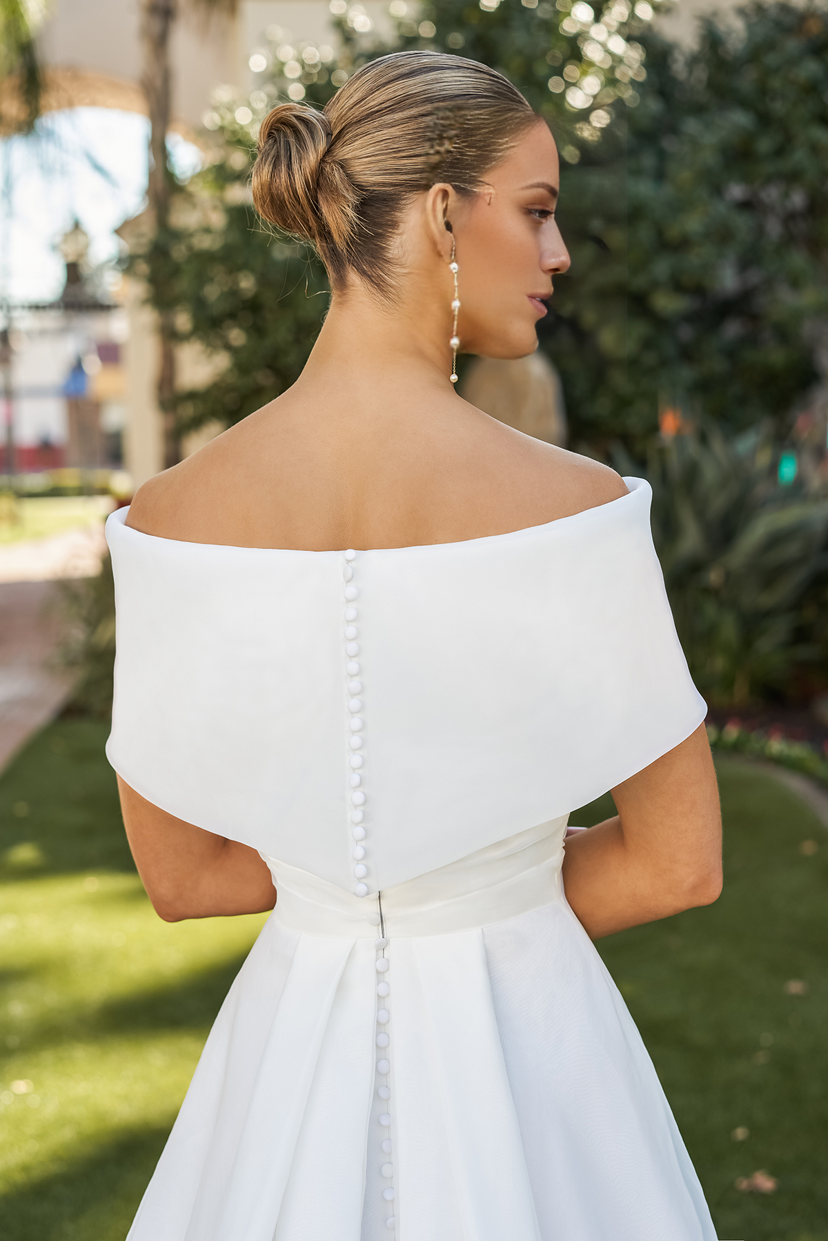 A-line off shoulder collar with side slit and floor length wedding dress