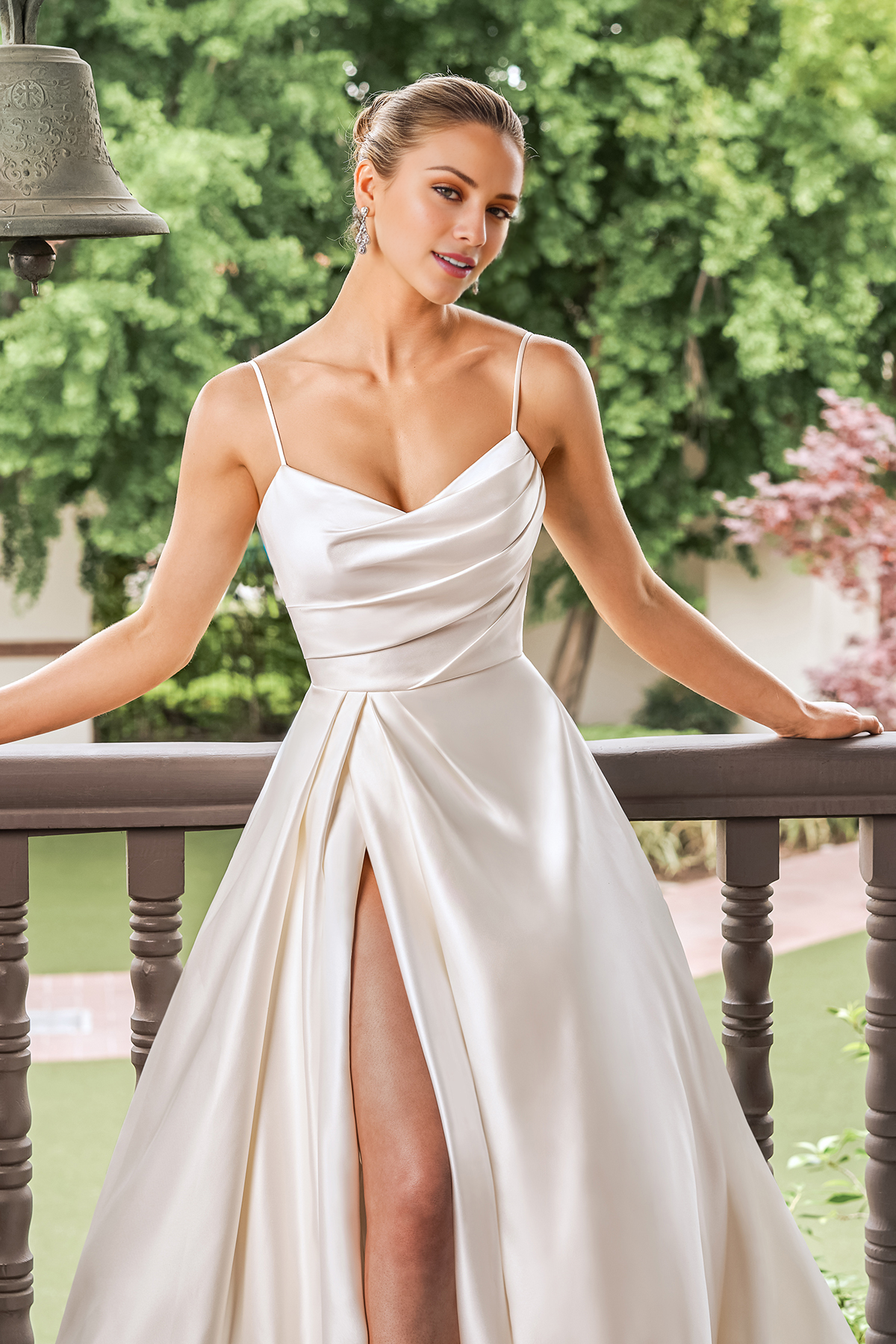 A-line satin asymmetric pleated garment with side slits and floor length wedding dress