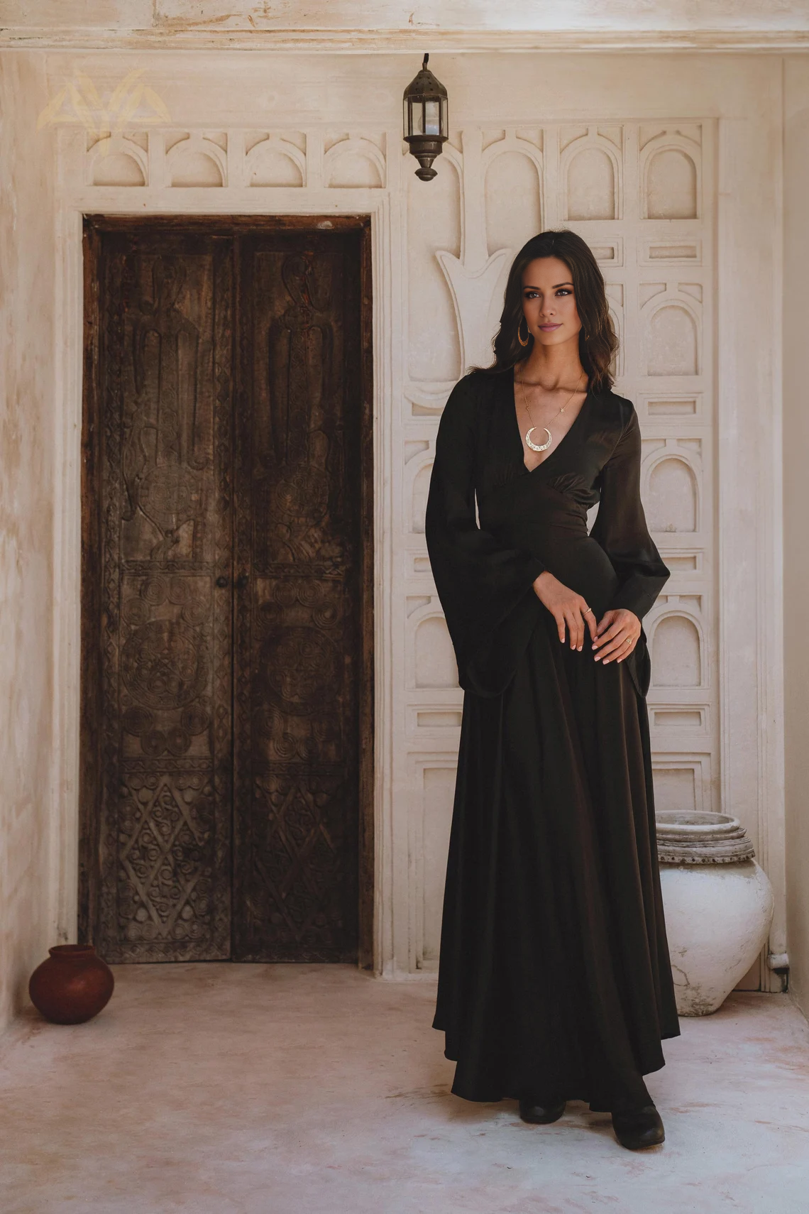 Jimiss V-neck long sleeved backless and floor length evening dress