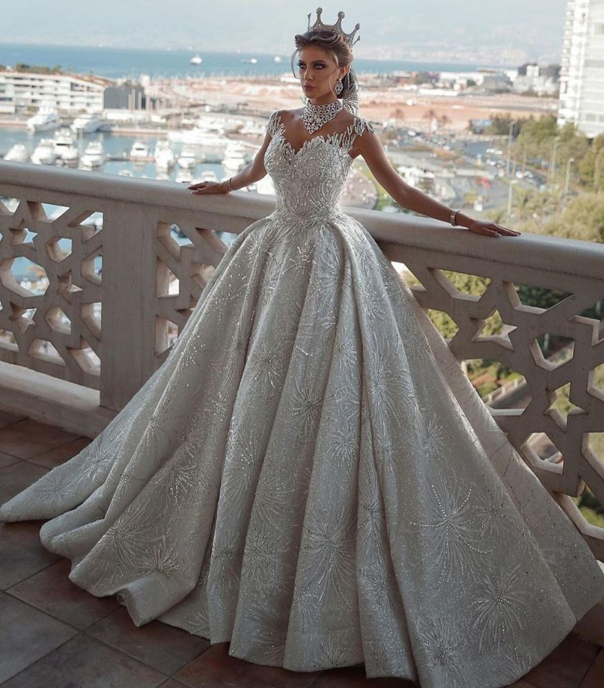 Classy Ball Gown Wedding Dress with Cap Sleeves and Beadings