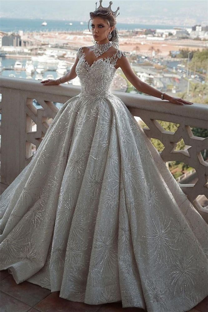Classy Ball Gown Wedding Dress with Cap Sleeves and Beadings