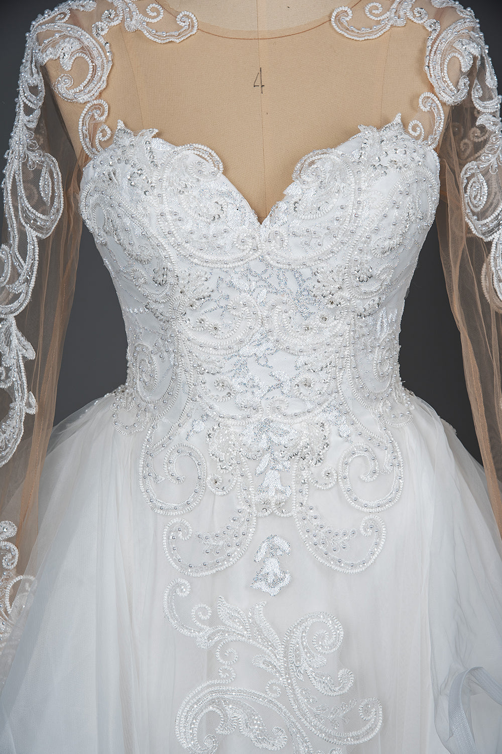 Elegant Long Sleeve Ball Gown Wedding Dress with Lace Appliques