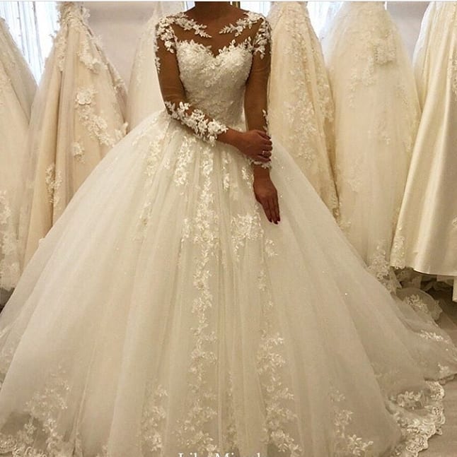 Elegant Long Sleeves Appliques Wedding Dress with Chic Lace Ruffles