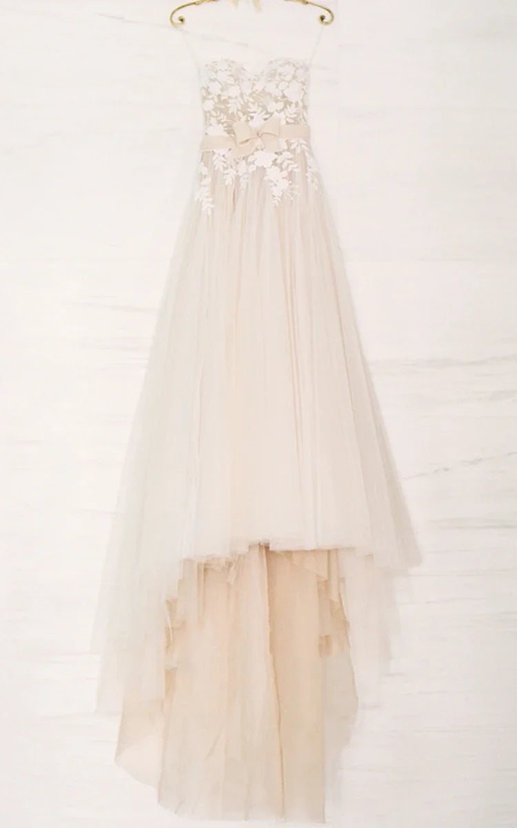 Ethereal A-Line Beach Tulle Wedding Dress With Spaghetti Straps And Open Back