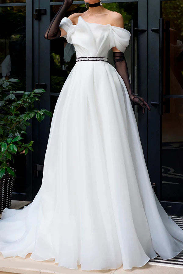 A Line strapless organza ivory rustic wedding dress paired with court train