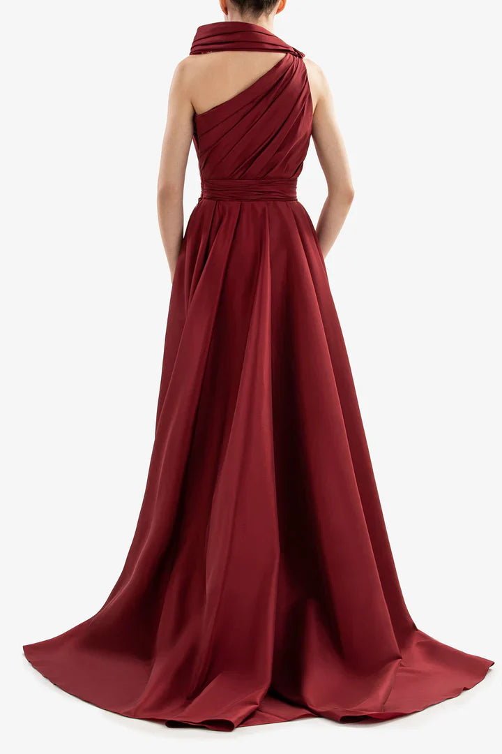 One shoulder pleated garment with evening gown