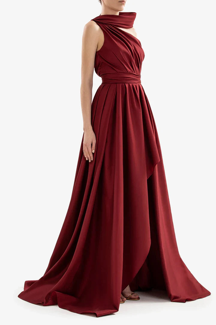 One shoulder pleated garment with evening gown